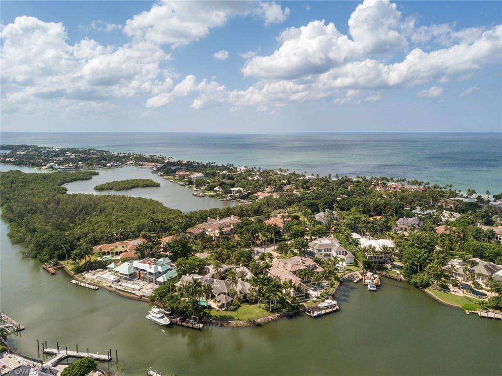 3275 Green Dolphin Lane Naples, FL 34102 - Photo 35 of 35 an aerial view of ocean and residential houses with outdoor space