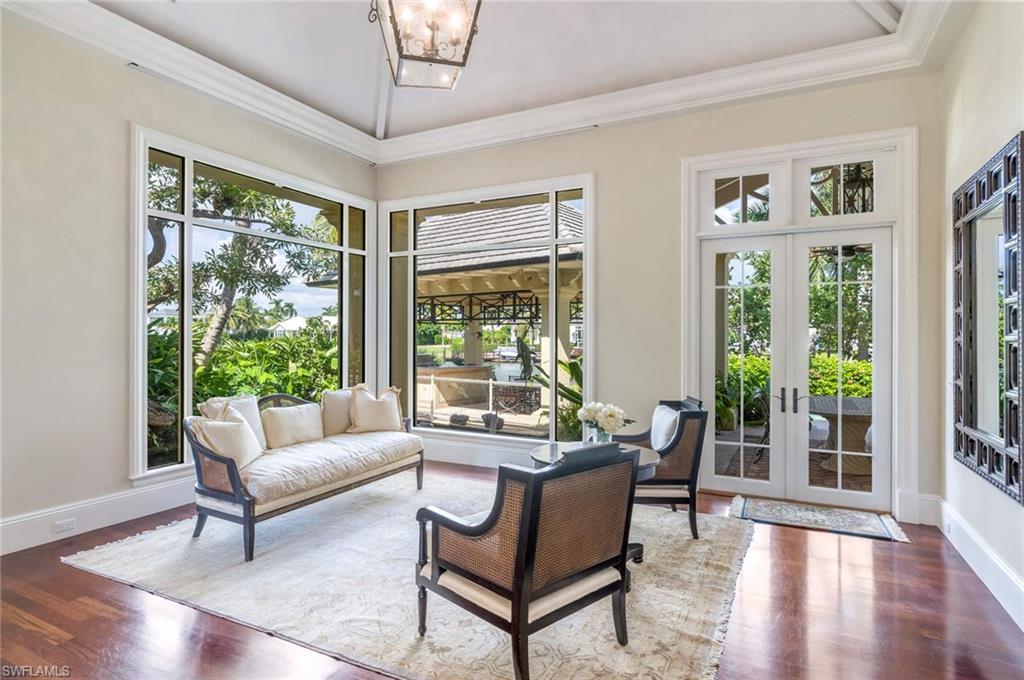 3275 Green Dolphin Lane Naples, FL 34102 - Photo 5 of 35 a living room with furniture and a large window