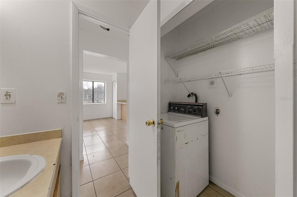 2547 Myrtle Avenue Sanford, FL 32773 - Photo 11 of 13 a utility room with dryer and washer