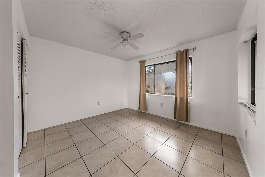 2547 Myrtle Avenue Sanford, FL 32773 - Photo 8 of 13 a view of an empty room and window