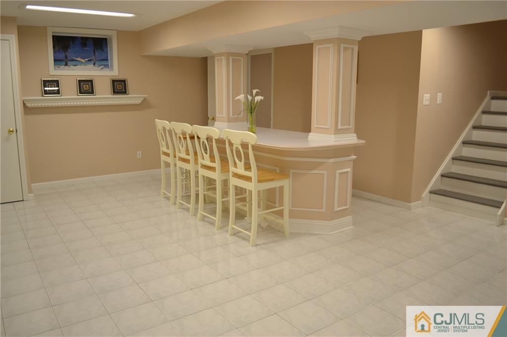 19 Dickerson Lane, Unit X Old Bridge, NJ 08857 - Photo 18 of 25 a room with furniture and a window