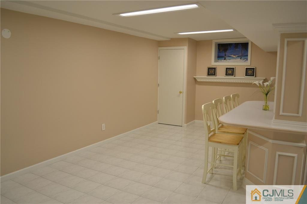 19 Dickerson Lane, Unit X Old Bridge, NJ 08857 - Photo 19 of 25 a view of kitchen with furniture and window