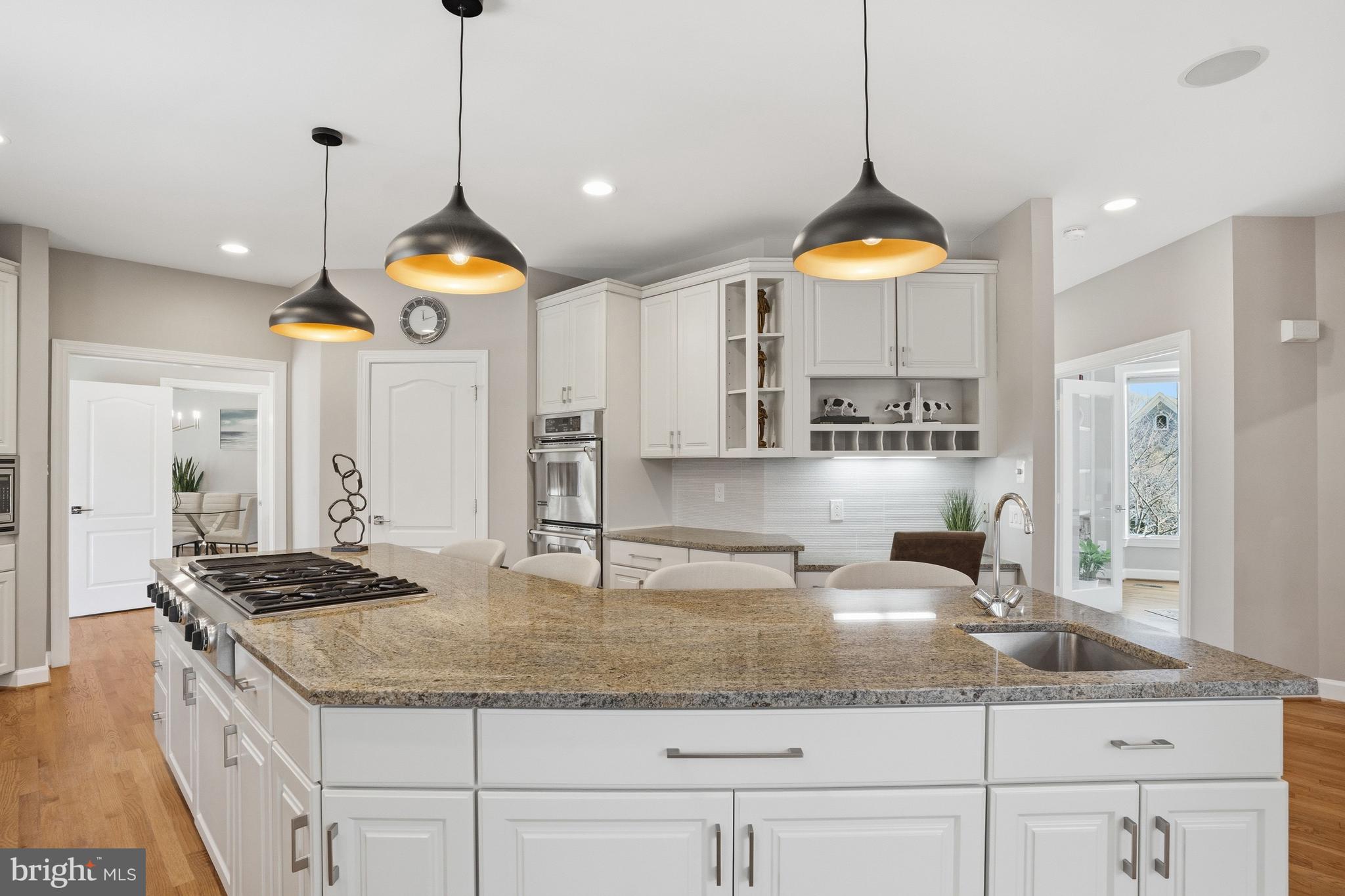 1156 Fieldview Drive Reston, VA 20194 - Photo 27 of 104 a kitchen with stainless steel appliances granite countertop a stove a sink and a refrigerator