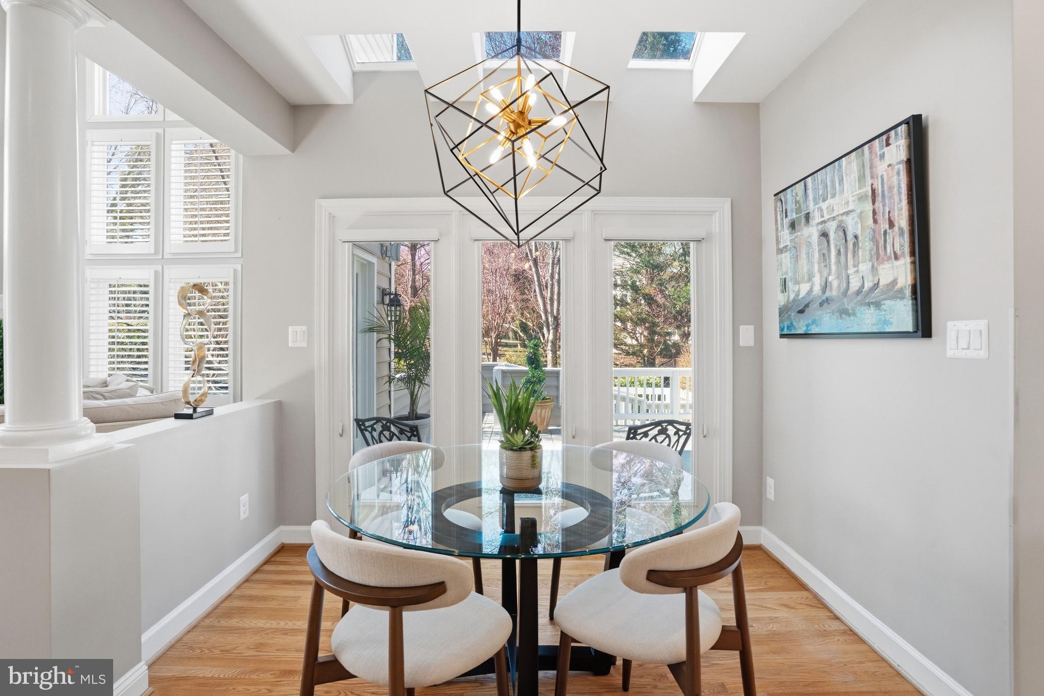 1156 Fieldview Drive Reston, VA 20194 - Photo 31 of 104 a view of a dining room with furniture wooden floor and a chandelier
