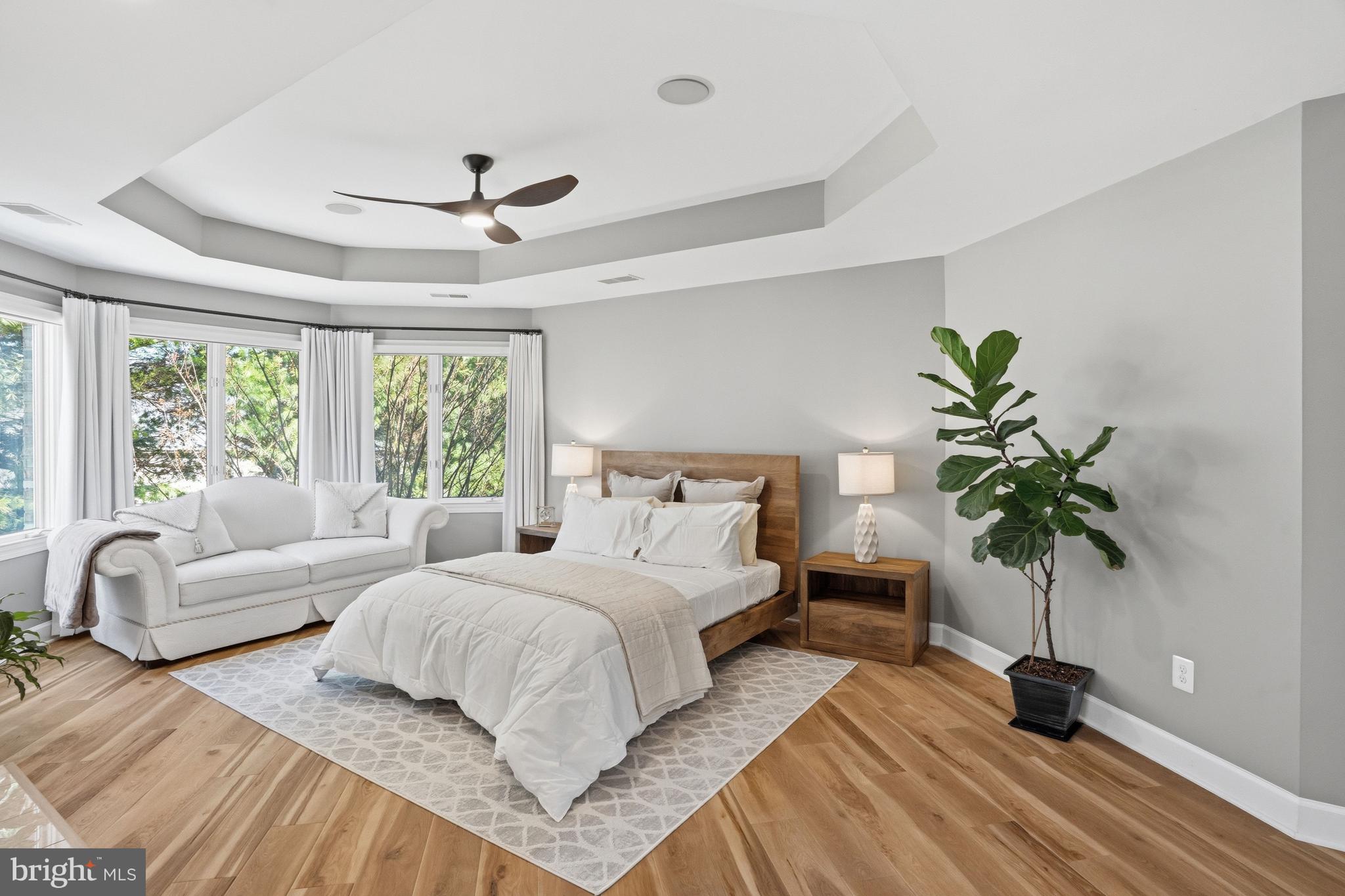 1156 Fieldview Drive Reston, VA 20194 - Photo 50 of 104 a bedroom with a large bed and a potted plant