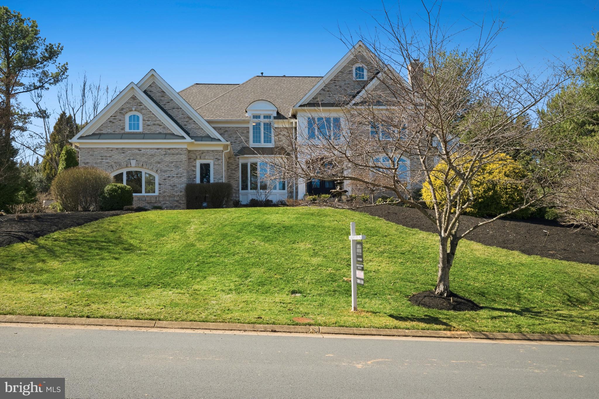 1156 Fieldview Drive Reston, VA 20194 - Photo 6 of 104 a front view of a house with garden