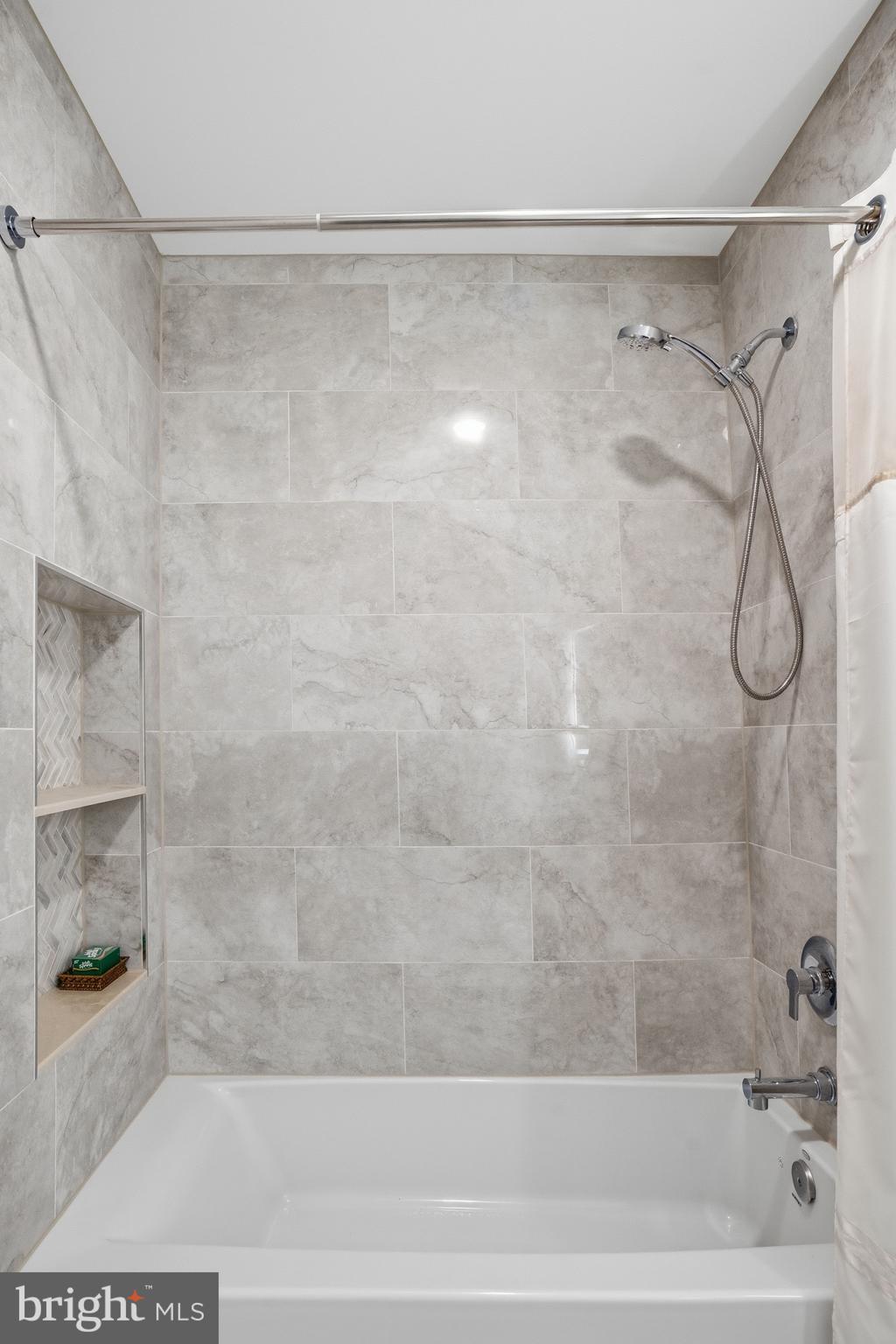 1156 Fieldview Drive Reston, VA 20194 - Photo 66 of 104 a bathroom with a shower and a bath tub