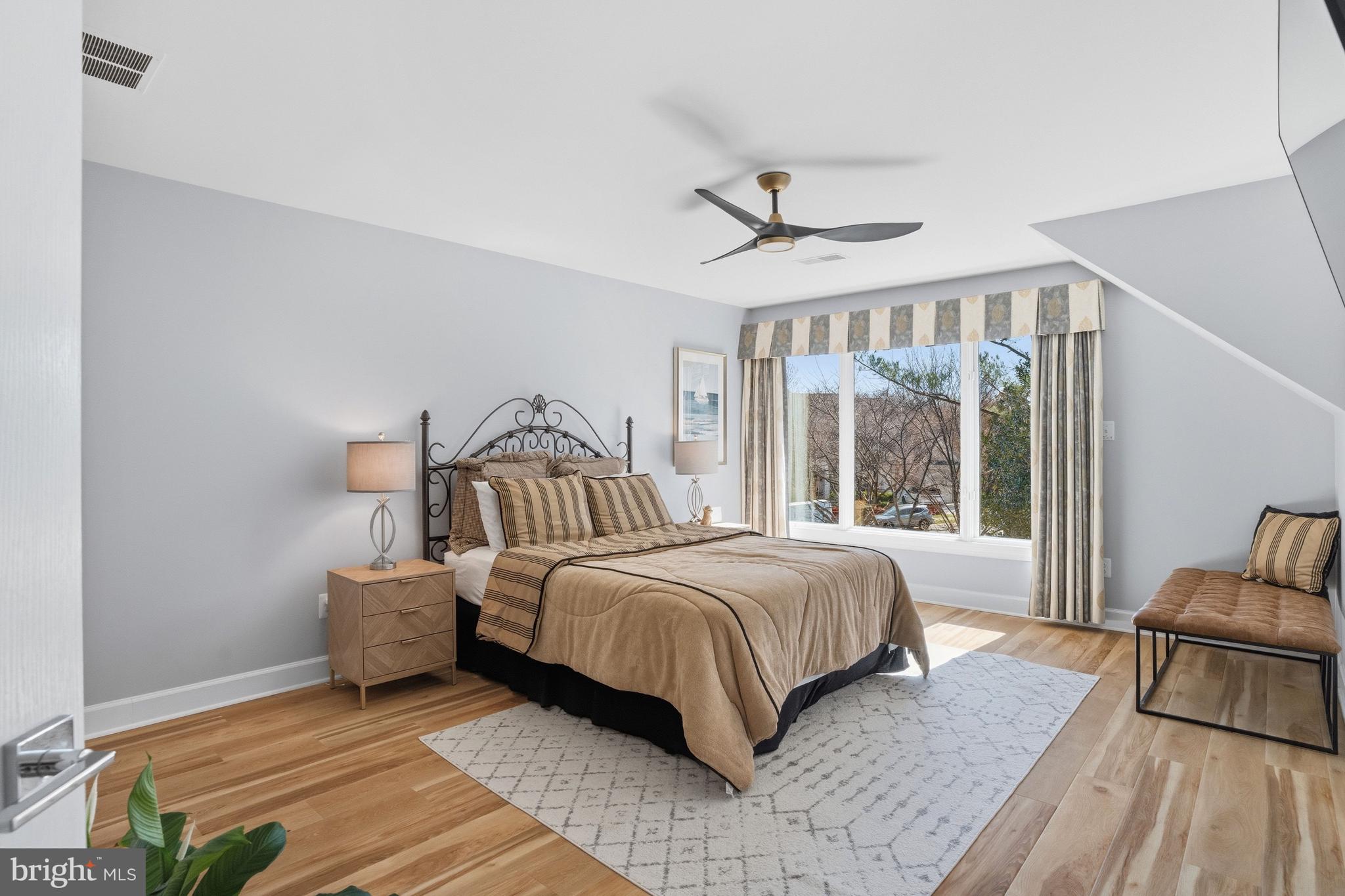 1156 Fieldview Drive Reston, VA 20194 - Photo 73 of 104 a bedroom with a bed and large window