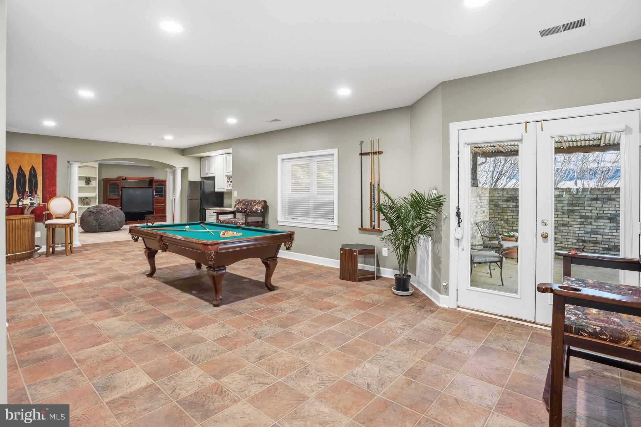 1156 Fieldview Drive Reston, VA 20194 - Photo 84 of 104 a living room with furniture a window and a table