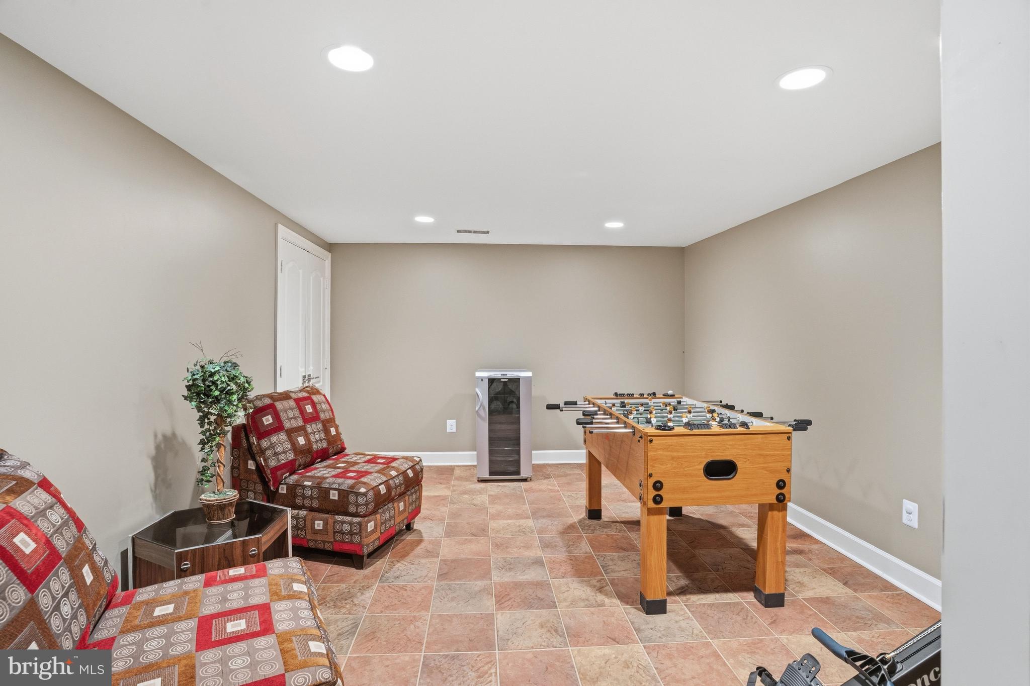 1156 Fieldview Drive Reston, VA 20194 - Photo 88 of 104 a reading room with furniture and wooden floor