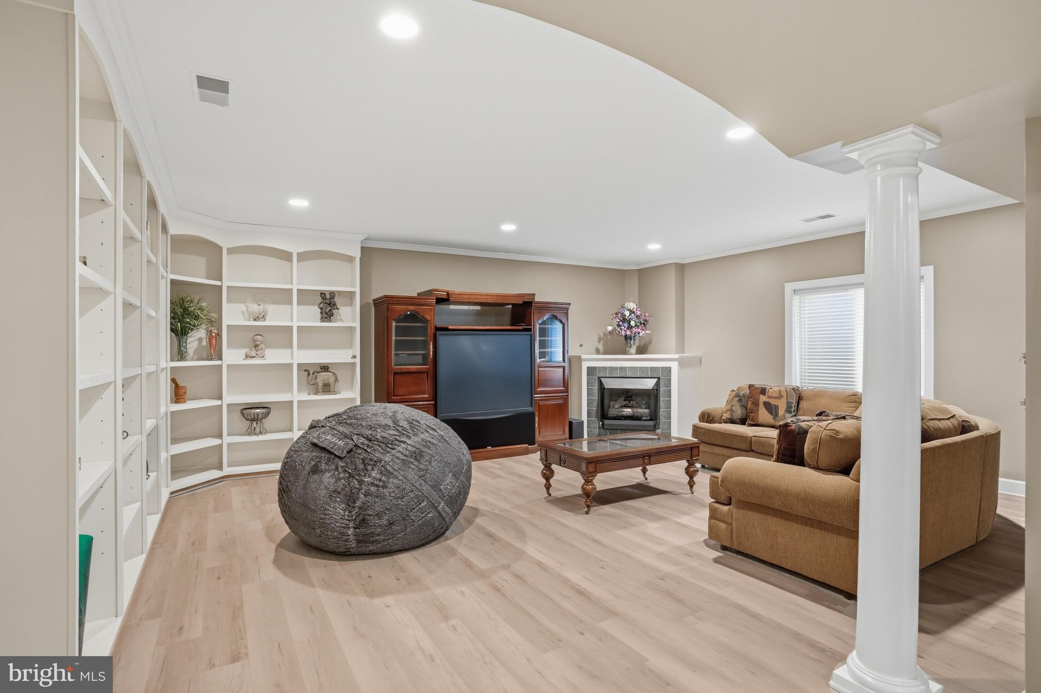 1156 Fieldview Drive Reston, VA 20194 - Photo 90 of 104 a living room with furniture and a flat screen tv