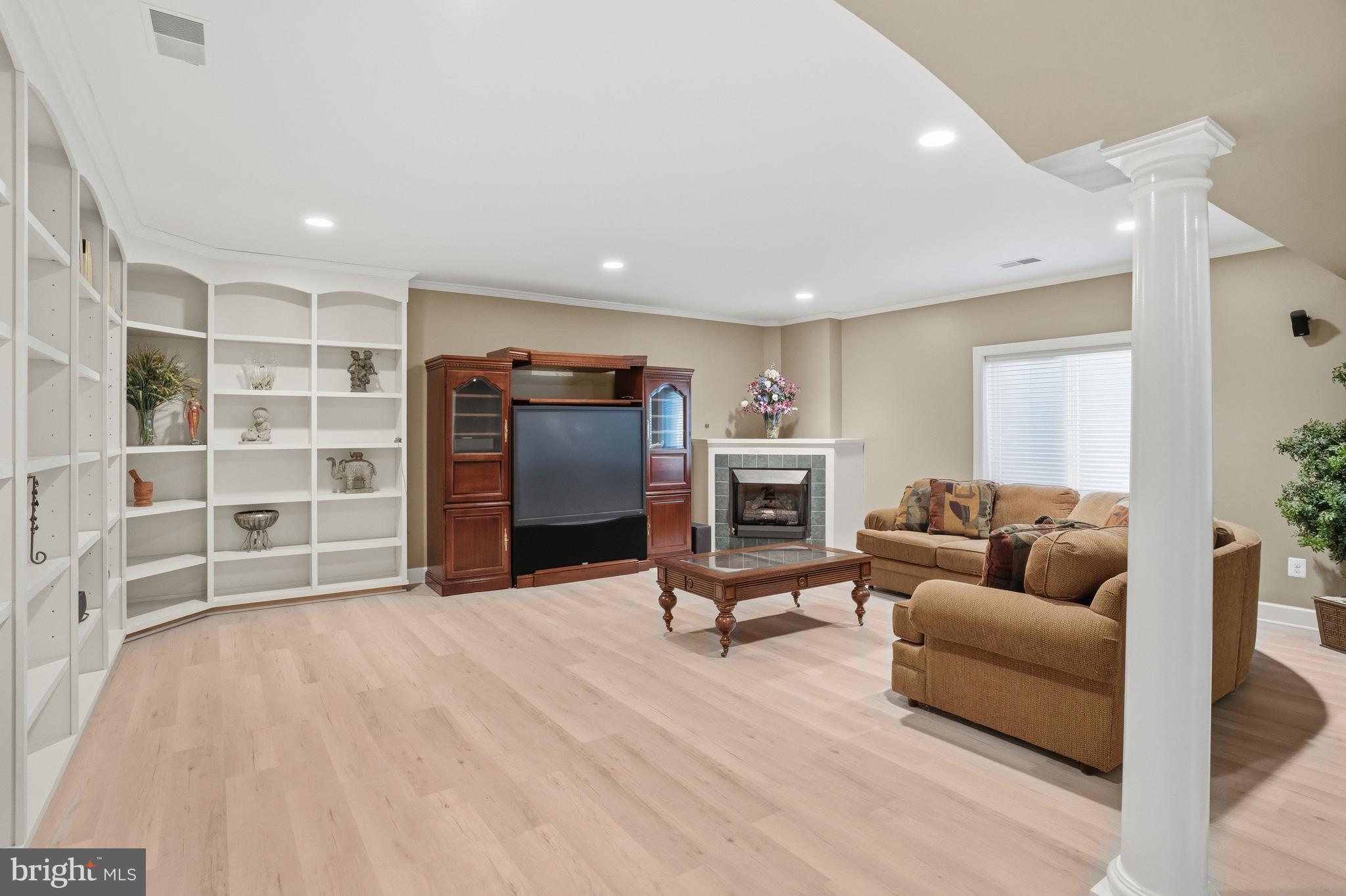 1156 Fieldview Drive Reston, VA 20194 - Photo 92 of 104 a living room with furniture and a flat screen tv