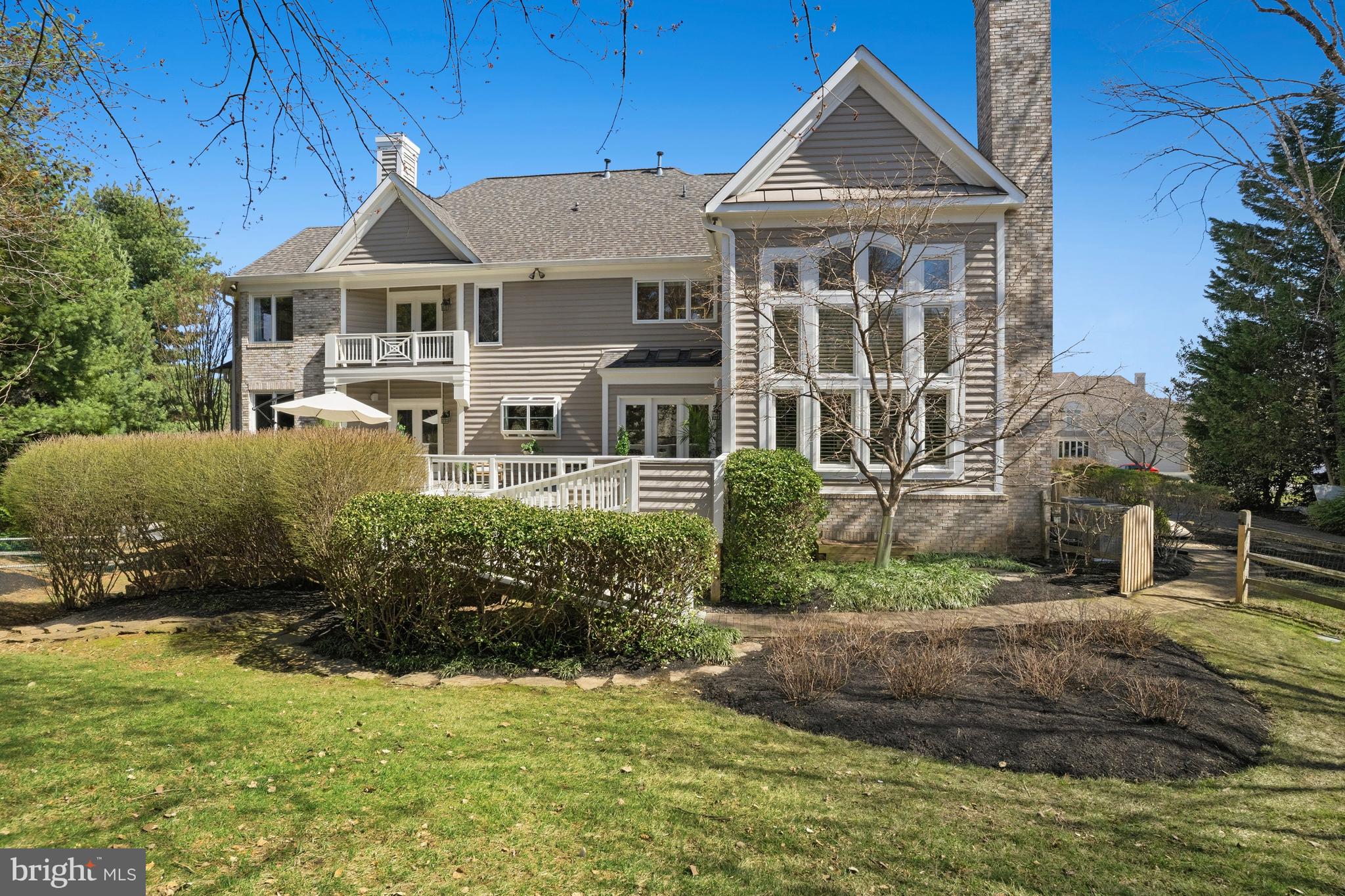 1156 Fieldview Drive Reston, VA 20194 - Photo 99 of 104 a front view of a house with a yard