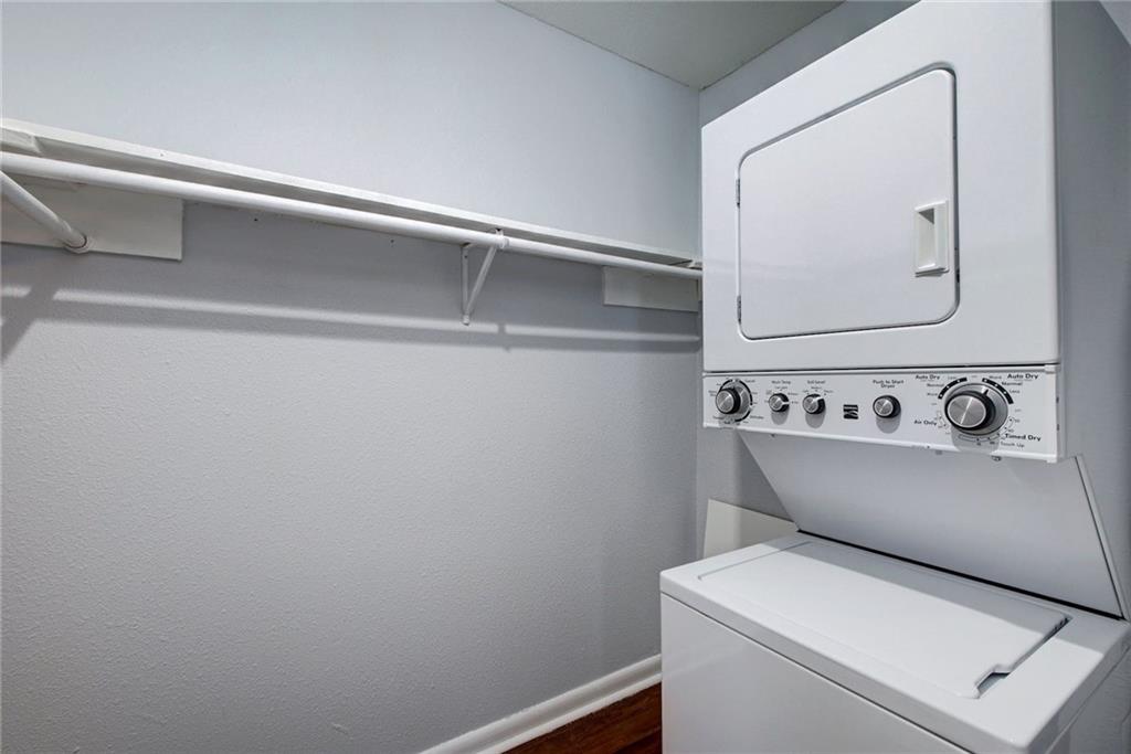 2401 Manor Road, Unit 127 Austin, TX 78722 - Photo 11 of 20 a utility room with dryer and washer