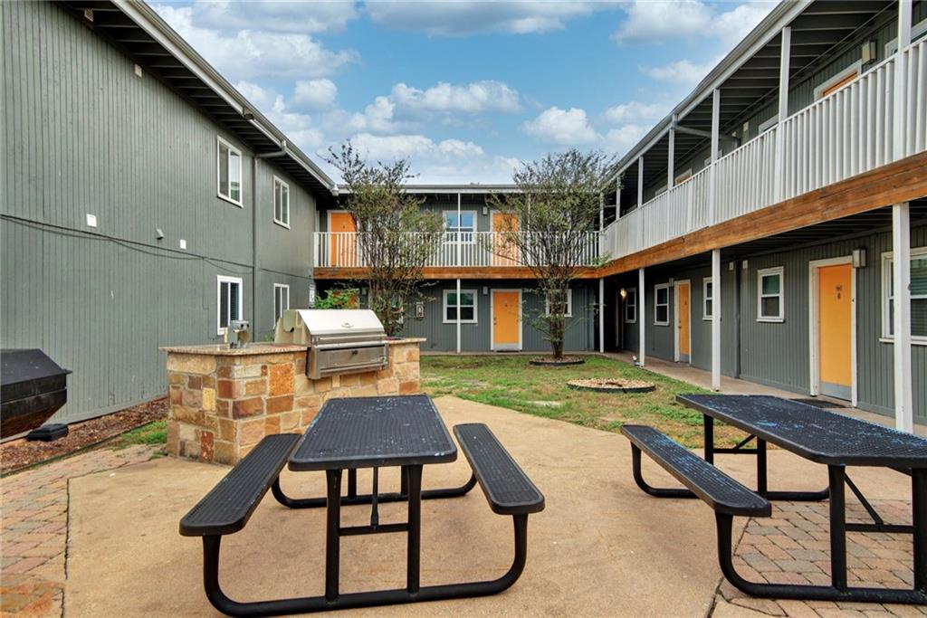 2401 Manor Road, Unit 127 Austin, TX 78722 - Photo 14 of 20 a view of a house with backyard
