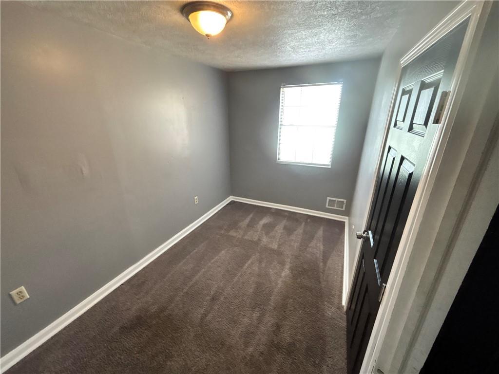 335 Cedarhurst Street Pittsburgh, PA 15210 - Photo 24 of 28 an empty room with windows