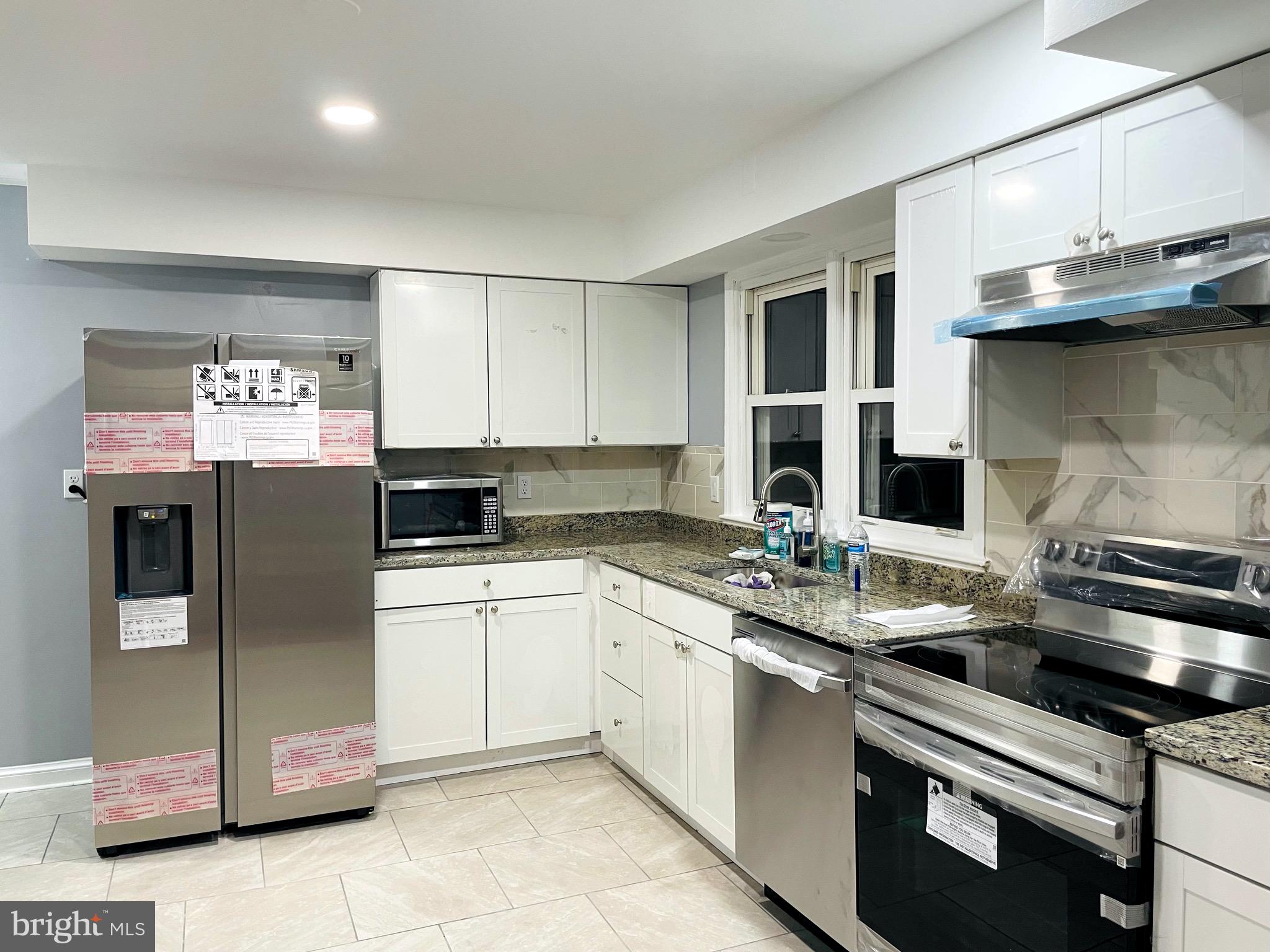7217 Adelphi Road College Park, MD 20740 - Photo 9 of 26 Renovated kitchen