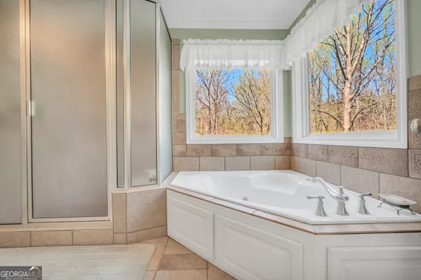 a view of lake with a yard