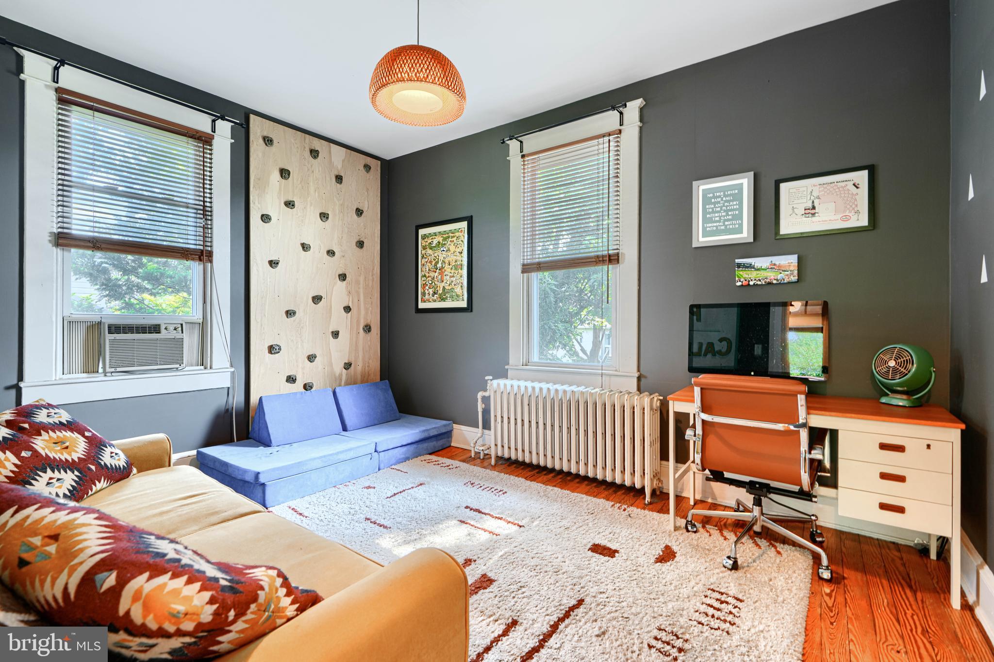 5316 Catalpha Road Baltimore, MD 21214 - Photo 27 of 54 a bedroom with furniture and a window