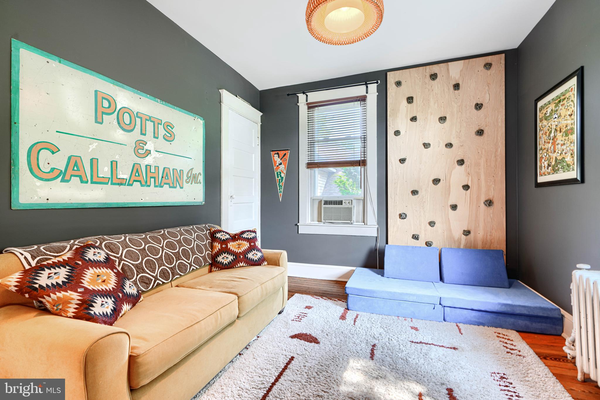 5316 Catalpha Road Baltimore, MD 21214 - Photo 28 of 54 a bedroom with furniture and a window