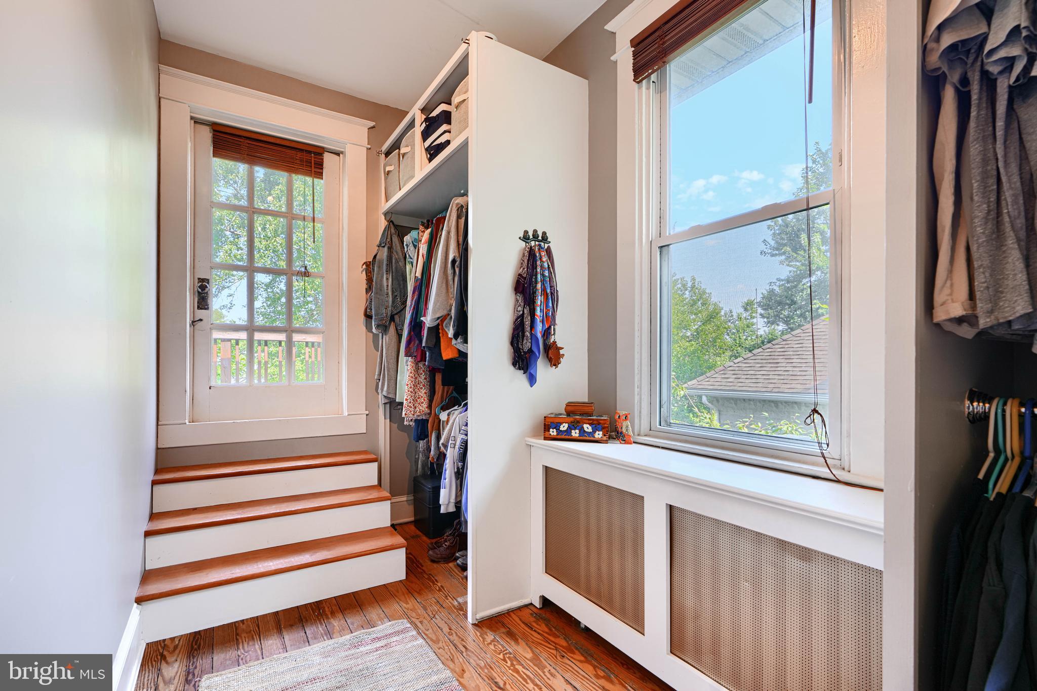 5316 Catalpha Road Baltimore, MD 21214 - Photo 31 of 54 a view of walk in closet with clothes and shoes