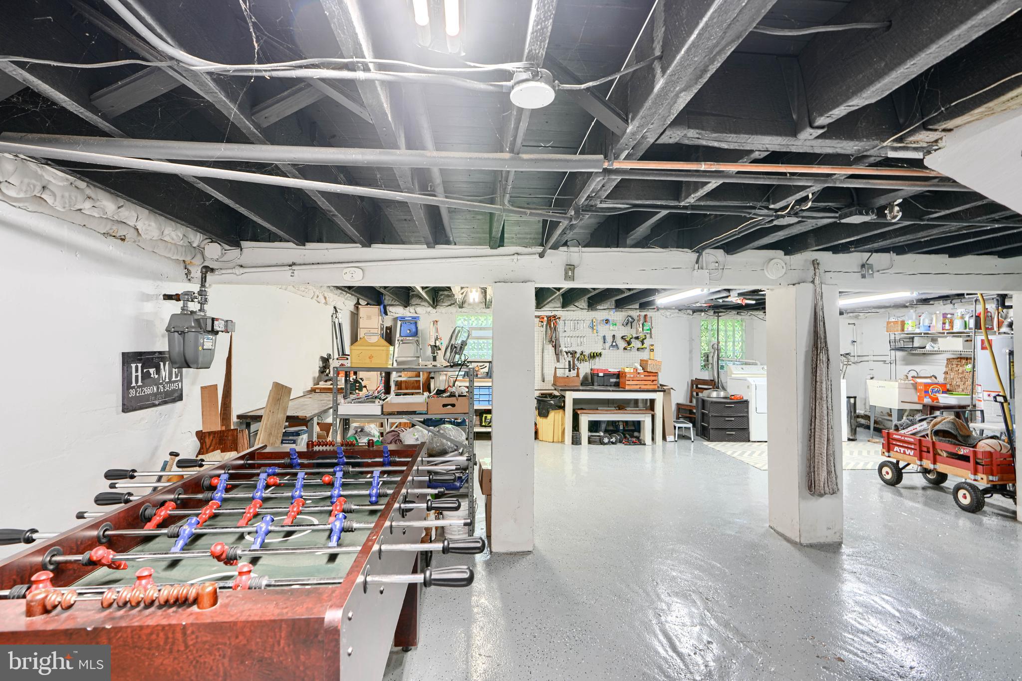5316 Catalpha Road Baltimore, MD 21214 - Photo 36 of 54 a view of a storage room with racks