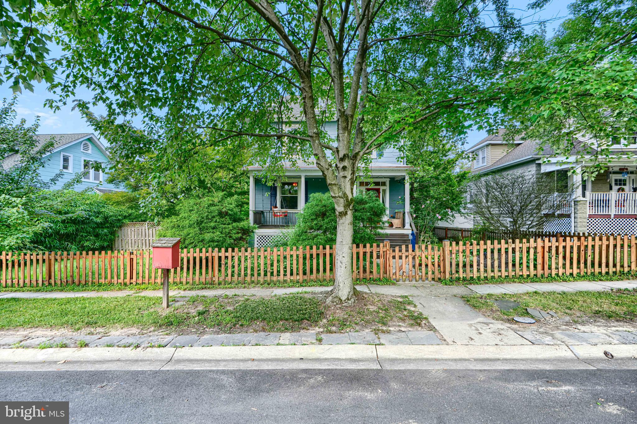 5316 Catalpha Road Baltimore, MD 21214 - Photo 48 of 54 a front view of a house with a garden