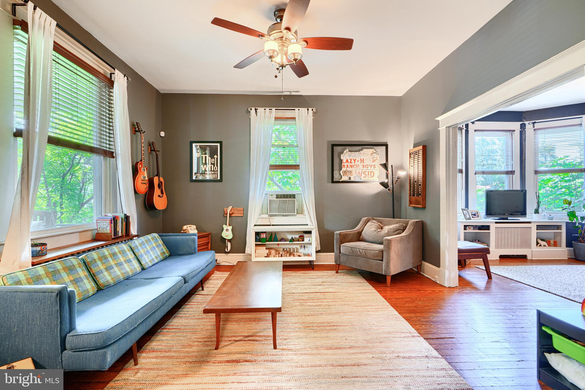 5316 Catalpha Road Baltimore, MD 21214 - Photo 7 of 54 a living room with furniture and a large window