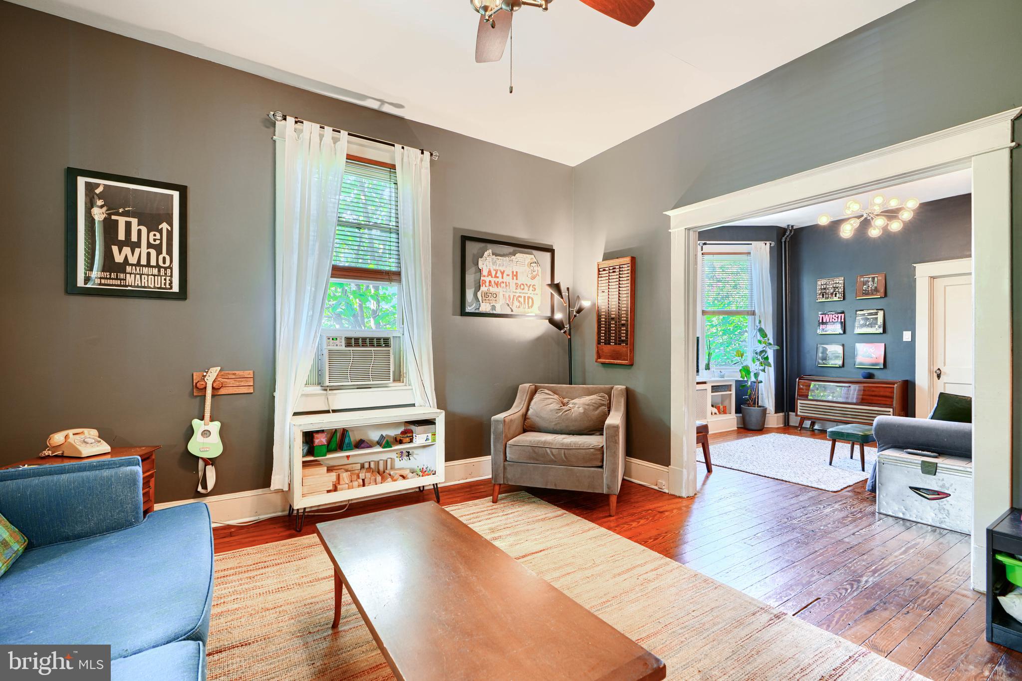 5316 Catalpha Road Baltimore, MD 21214 - Photo 8 of 54 a living room with furniture and a wooden floor