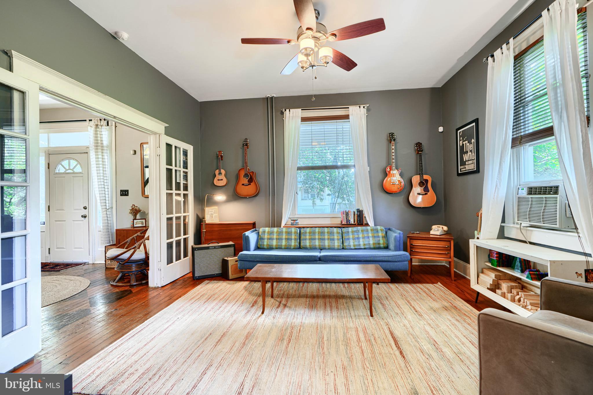 5316 Catalpha Road Baltimore, MD 21214 - Photo 10 of 54 a living room with furniture and wooden floor