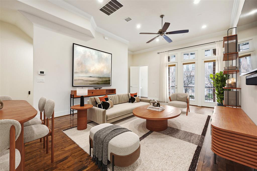 2134 Canton Street Dallas, TX 75201 - Photo 1 of 34 Living area with wood finished floors, ornamental molding, ceiling fan, and recessed lighting