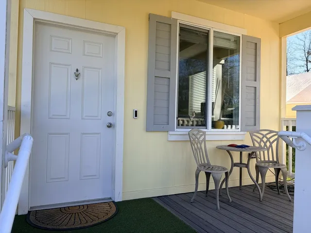 a kitchen with a sink a cabinets and window