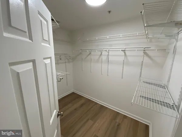 a view of a room with racks on the wall