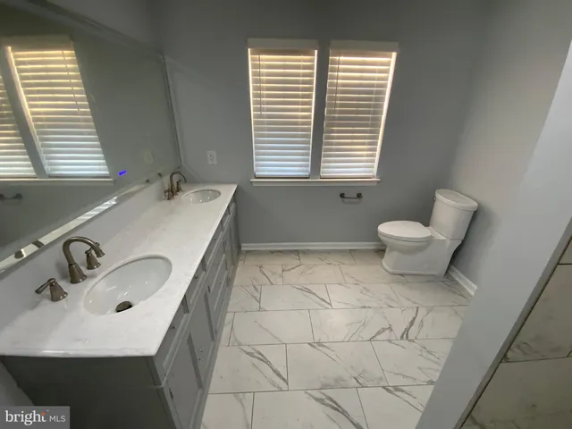 a bathroom with a sink and a bathtub