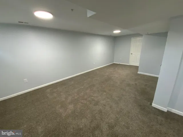 an empty room with a natural light