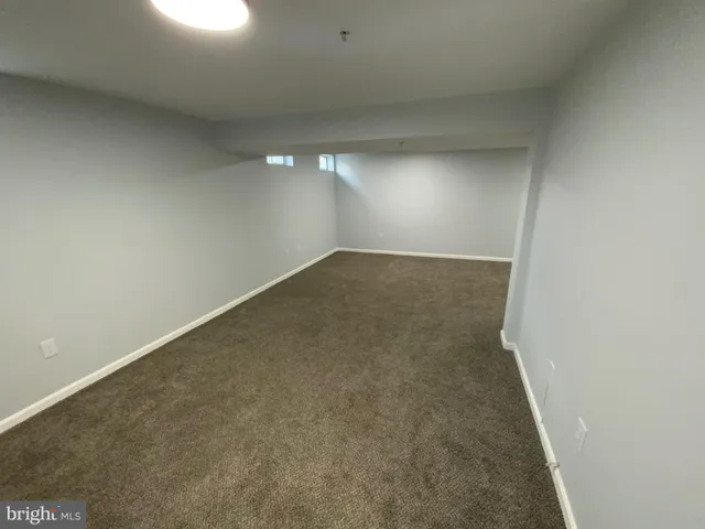 an empty room with a workbench