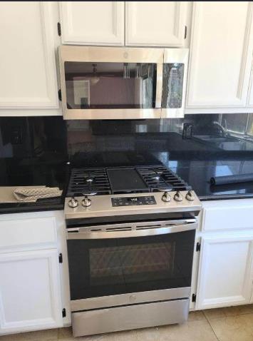 73 Images Circle Milpitas, CA 95035 - Photo 3 of 7 a stove top oven sitting inside of a kitchen