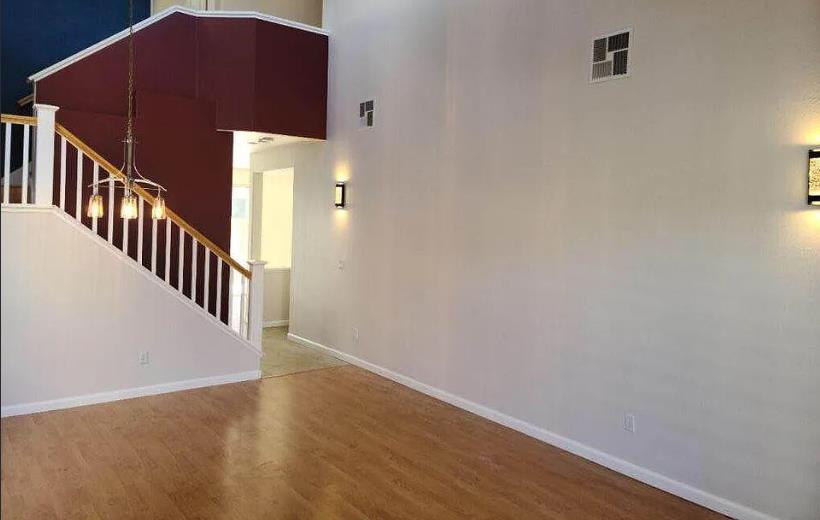 73 Images Circle Milpitas, CA 95035 - Photo 4 of 7 a view of an entryway with wooden floor