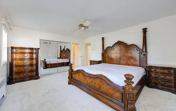 a bedroom with a bed and furniture