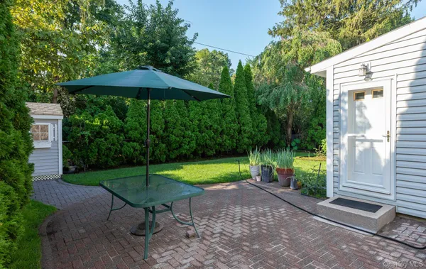 a view of a bench in a garden