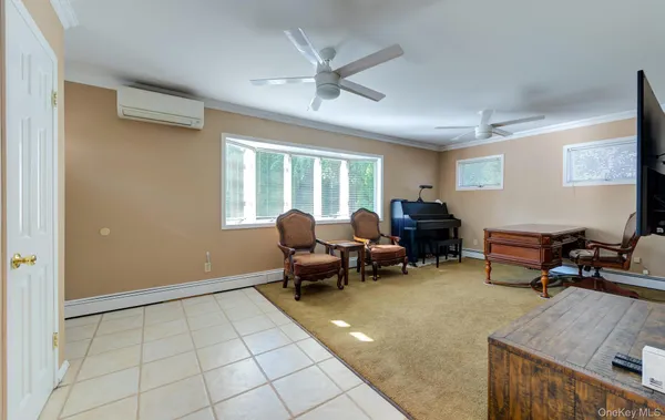 a living room with furniture and a window