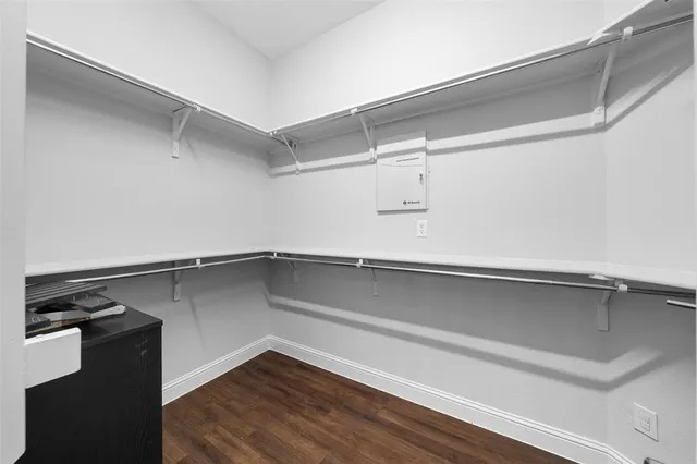 a view of a room with racks on the wall