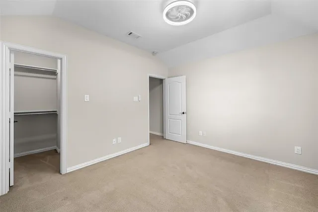a bathroom with a granite countertop sink mirror and a bath tub