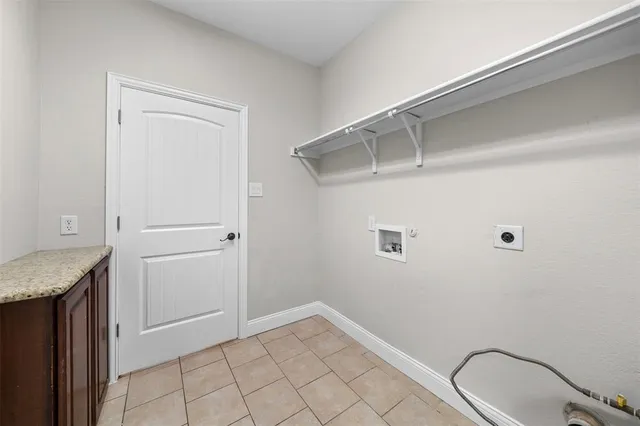 a bathroom with a sink toilet and a mirror