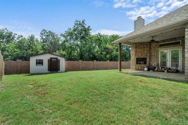 a house view with a garden space