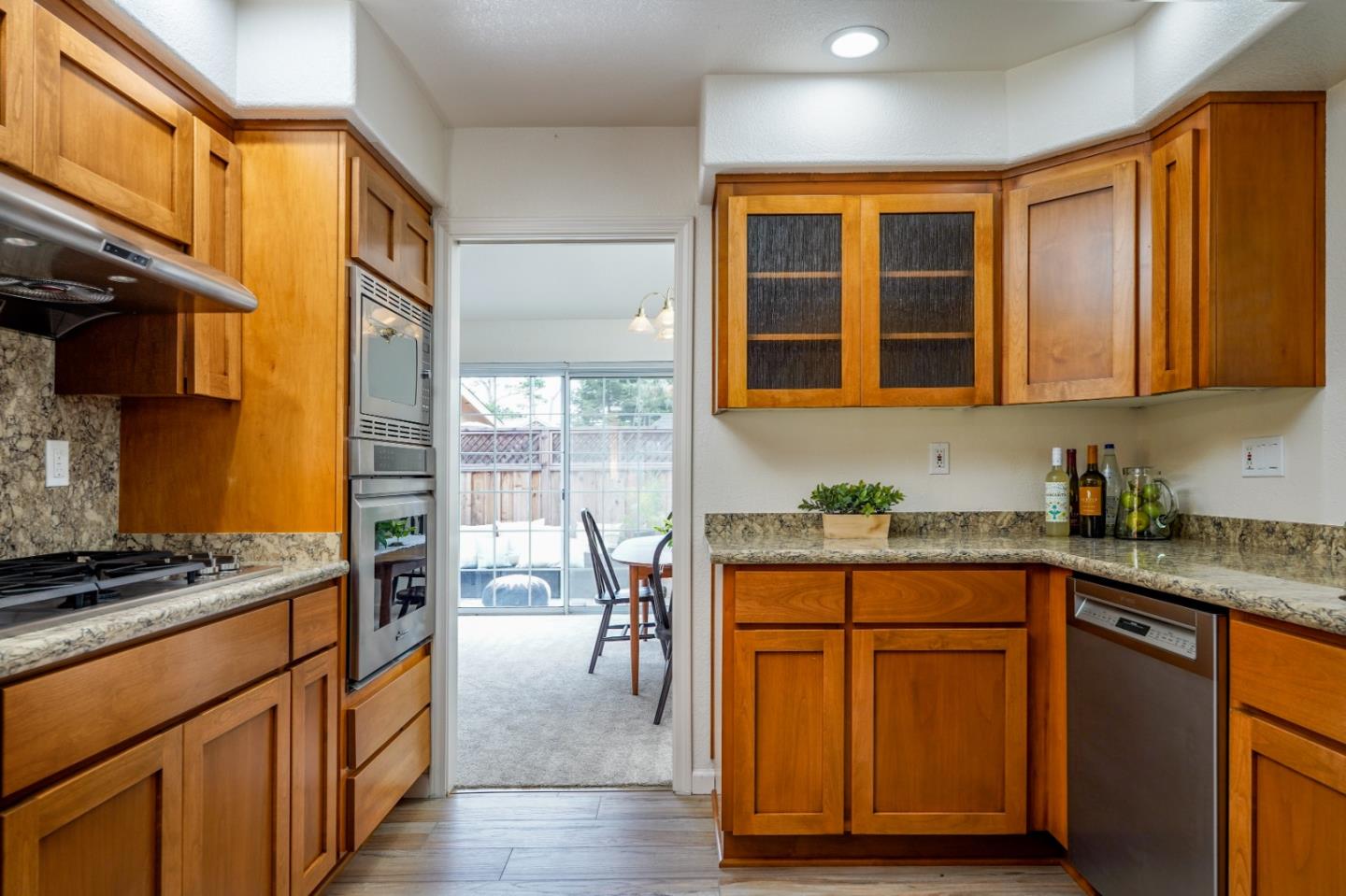 204 Ridge Road Pacific Grove, CA 93950 - Photo 6 of 15 a kitchen with stainless steel appliances granite countertop a stove and cabinets