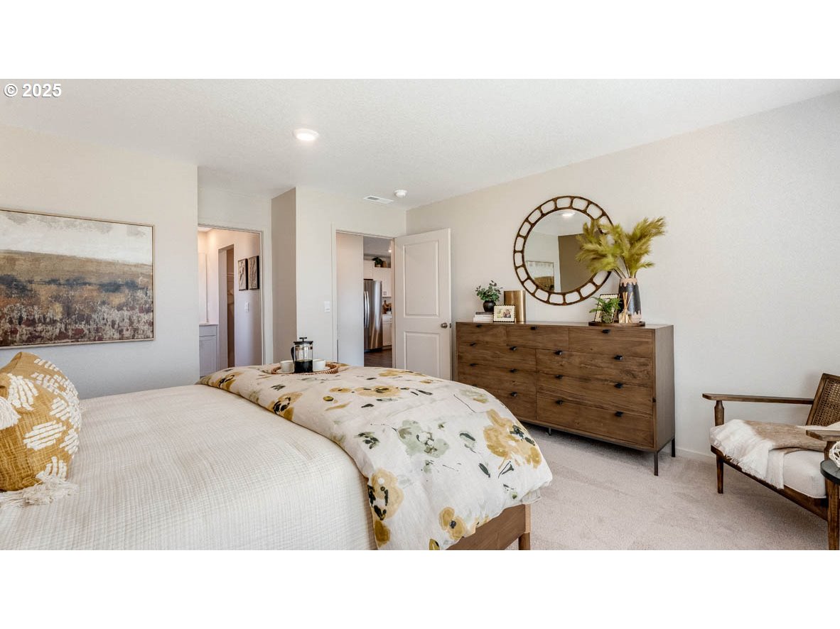 2905 V Street Springfield, OR 97477 - Photo 22 of 27 a bedroom with a bed and a dresser