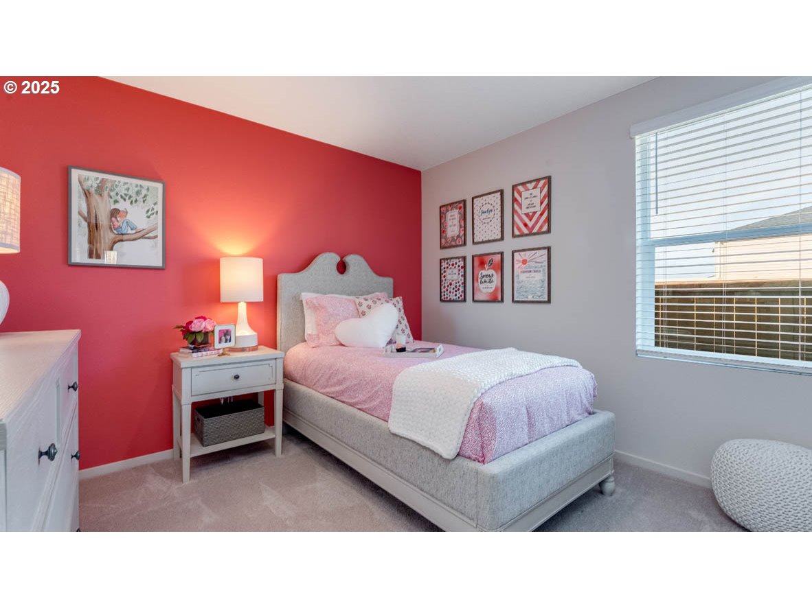 2905 V Street Springfield, OR 97477 - Photo 6 of 27 a bed room with a bed and a chair