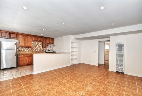 a view of a kitchen with a sink