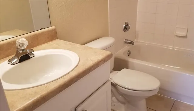 a bathroom with a toilet and a sink